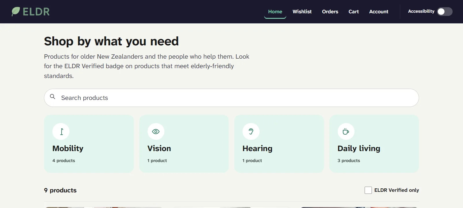 ELDR home page with a navy header and Accessibility switch, a Shop by what you need heading, a search bar, four category tiles (Mobility, Vision, Hearing, Daily living) and the top of the product cards for a walking device, hearing aid and bottle opener