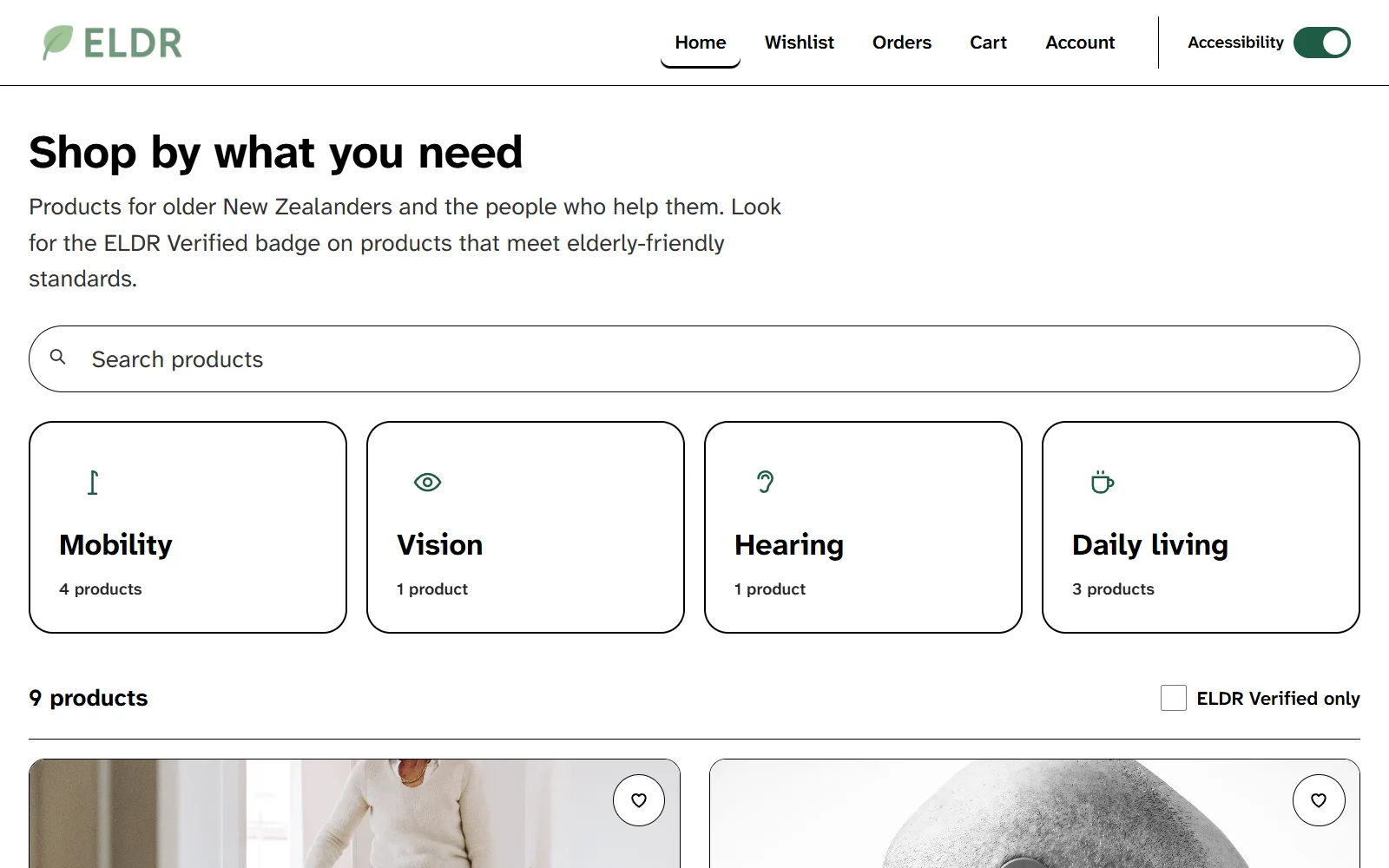 The same page with accessibility mode on: white header with black text, larger type, outlined category tiles with black borders and a two-column grid of larger product cards
